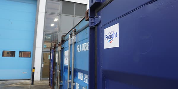 back entrance of hayle warehouse with containers
