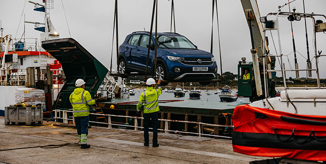 Loading a blue car onto Gry Maritha - private freight - Isles of Scilly Freight