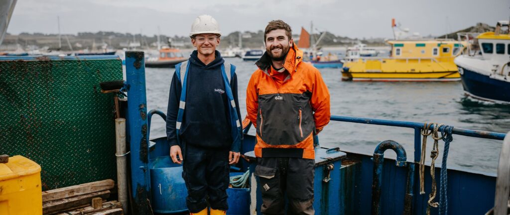 Ben and Connor standing on Lyonesse Lady's deck