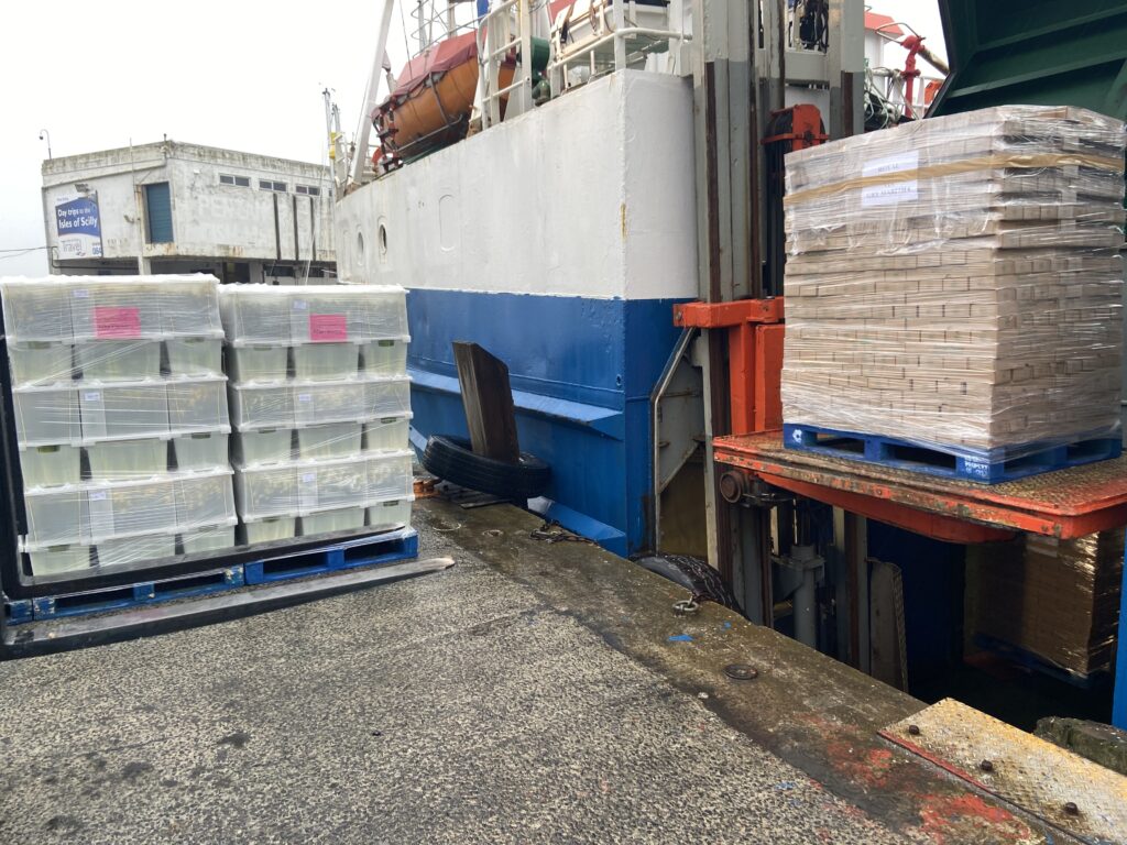 Flowers for onwards transport via Royal Mail and Conway Bailey, being unloaded on Penzance Quay