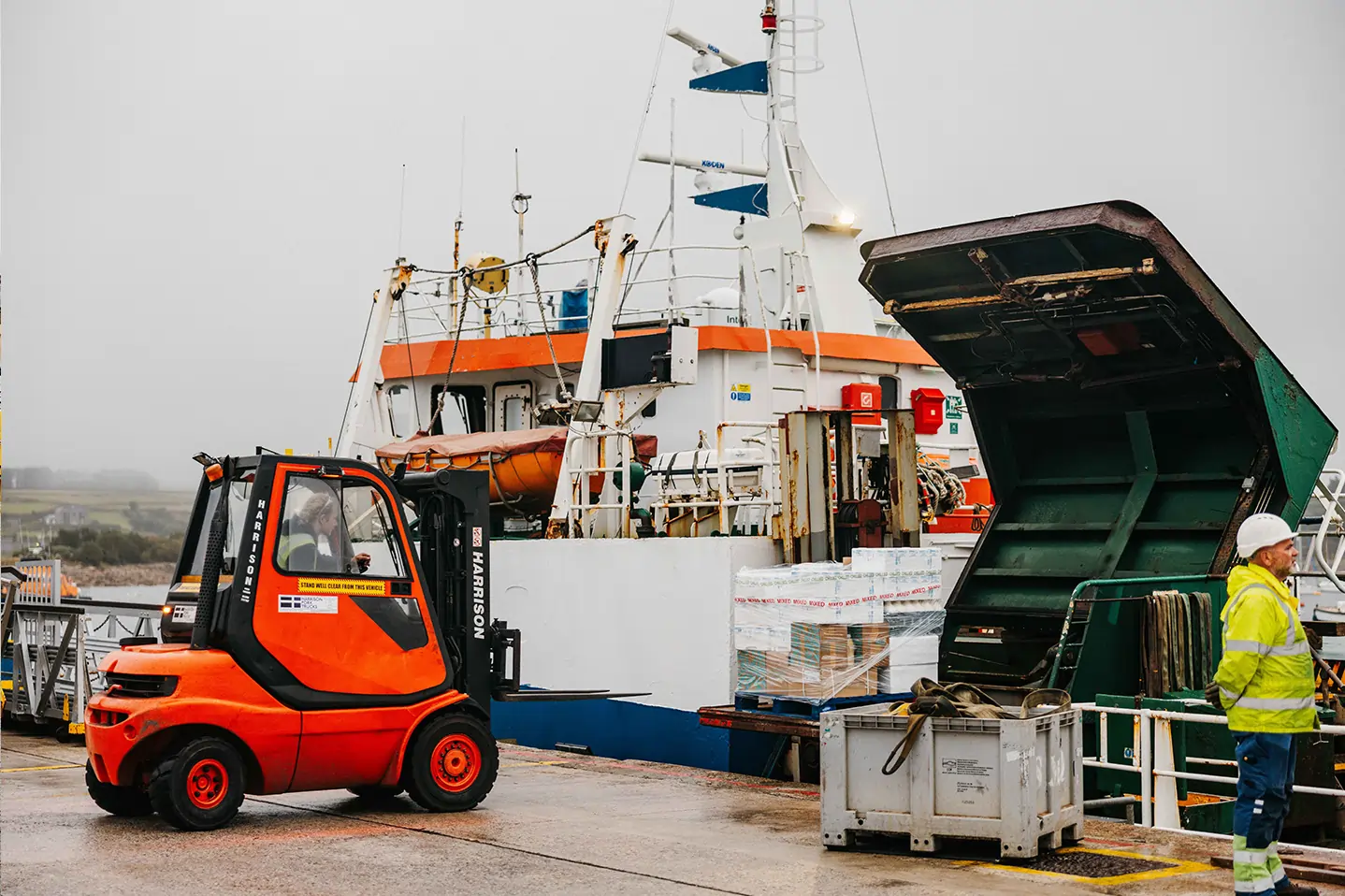 Forklift Truck unloading freight from the Gry Maritha, St Mary's, Isles of Scilly