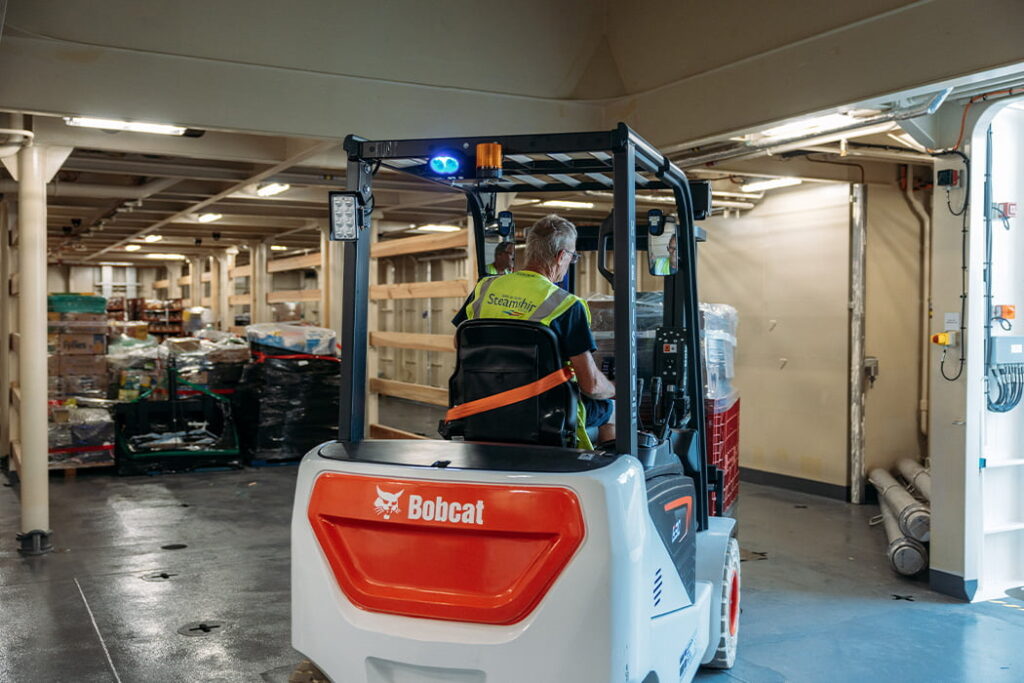 freight loading onto Menawethan with fork lift truck