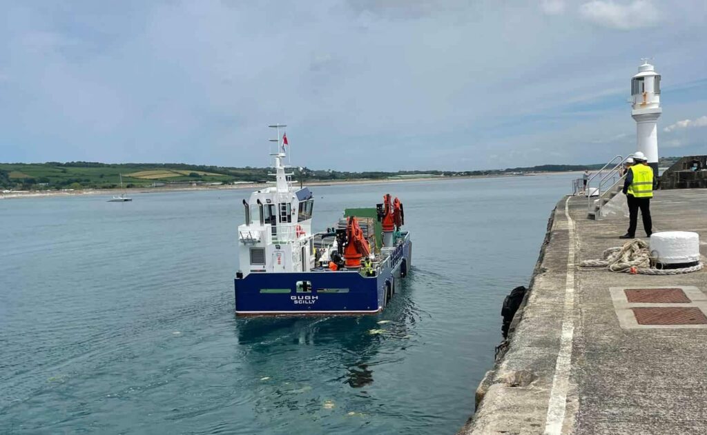 Gugh freight landing craft departing Penzance from lighthouse pier