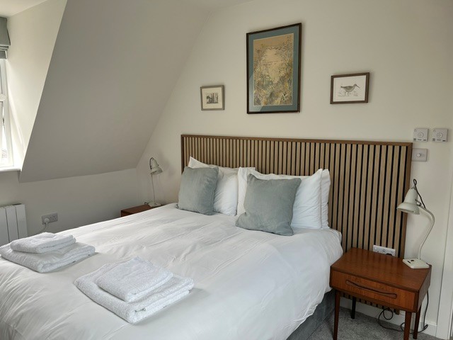 Bedroom inside Evergreen B&B