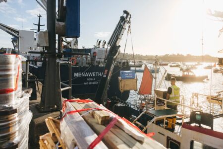 Lyonesse Lady being loaded by crane alongside St Mary's quay