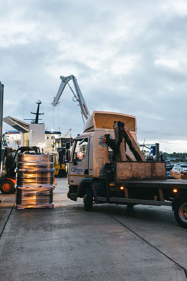 Island Carriers lorry collecting freight from St Mary's quay