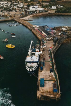 Drone view of Menawethan (freight ship) alongside St Mary's quay