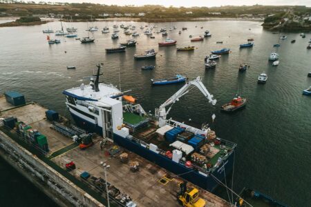 The freight ship Menawethan unloading cargo onto St Mary's Quay, Isles of Scilly