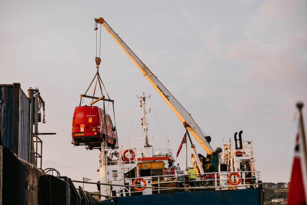 Postal van being lifted by crane onto Gry Maritha