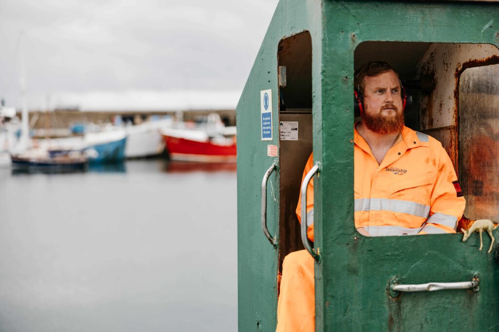 Justin White on forklift