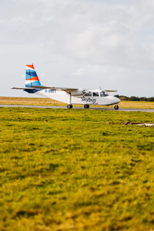 Skybus freight Islander on the runway at Land's End Airport getting ready to take off